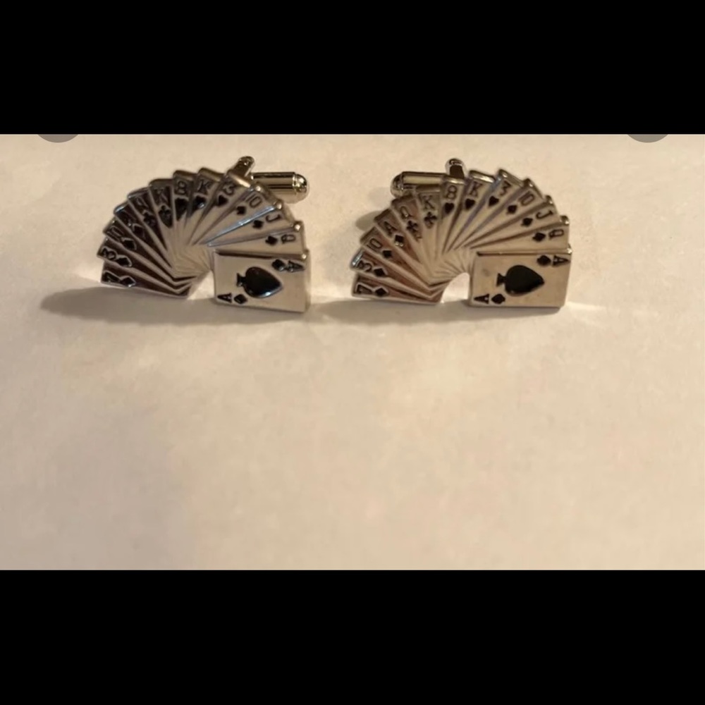 Cufflinks. Playing cards
